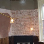 RED BRICK IS REVEALED AFTER THE SANDBLASTING