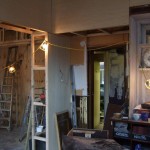 THE BAR IS SHORTENED AND A NEW ENTRANCE TO THE KITCHEN IS CREATED